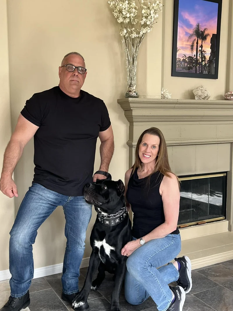Joseph and Mary with their dog at home